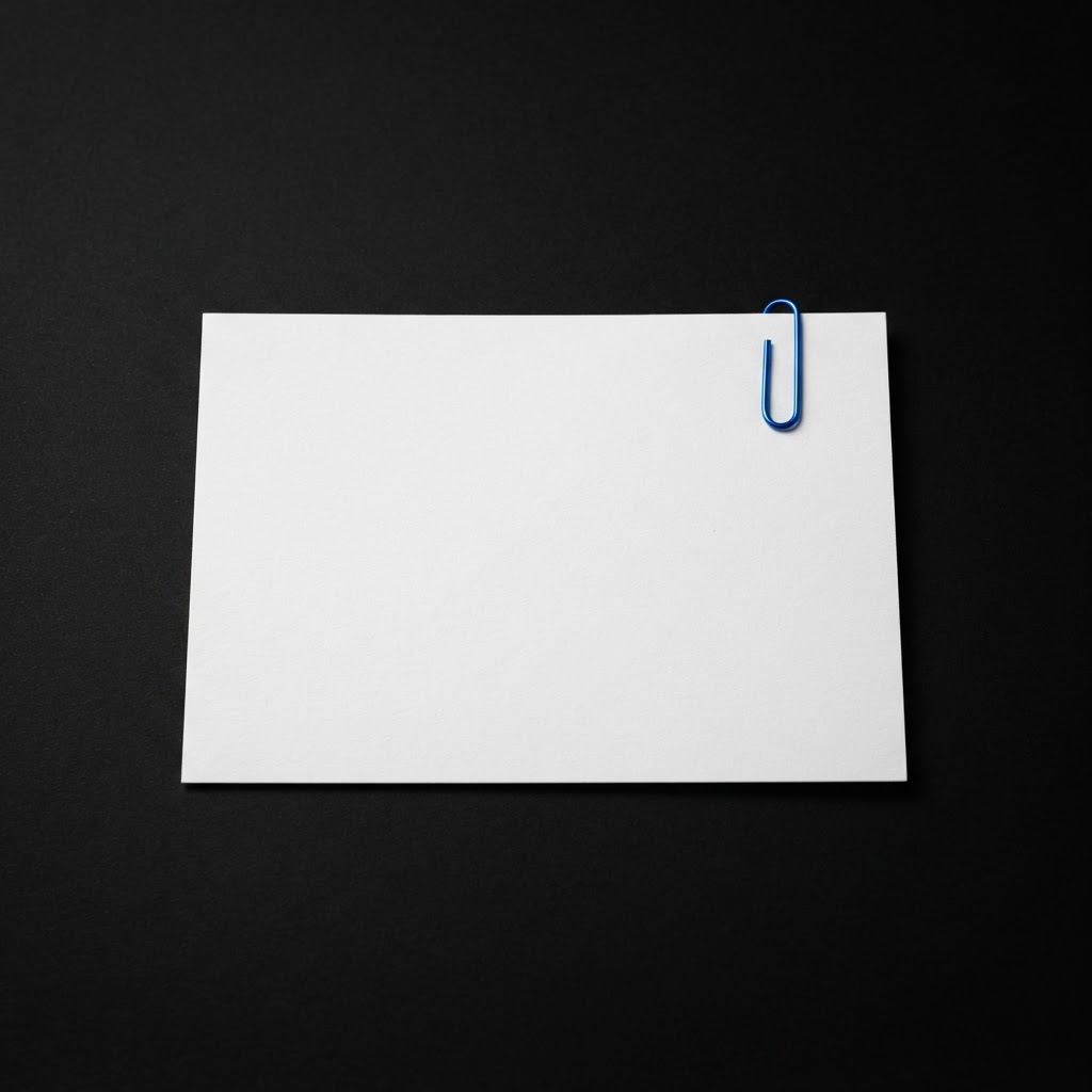 Minimalist white document with a single blue paperclip on a black background