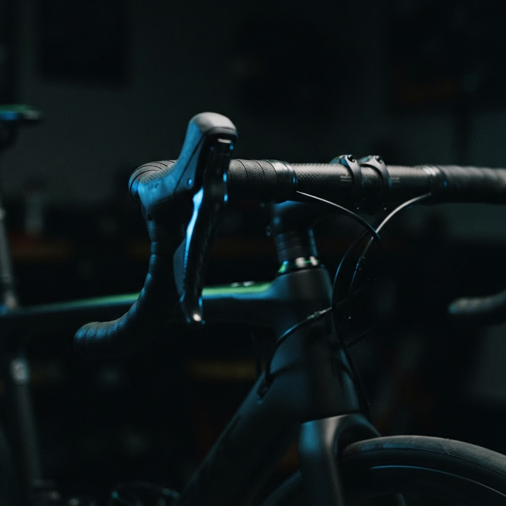 Close up of high performance bicycle handlebars in dark lighting