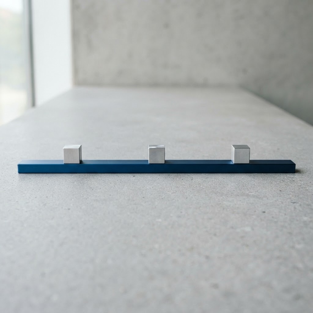Metallic cubes spaced along a blue metal bar